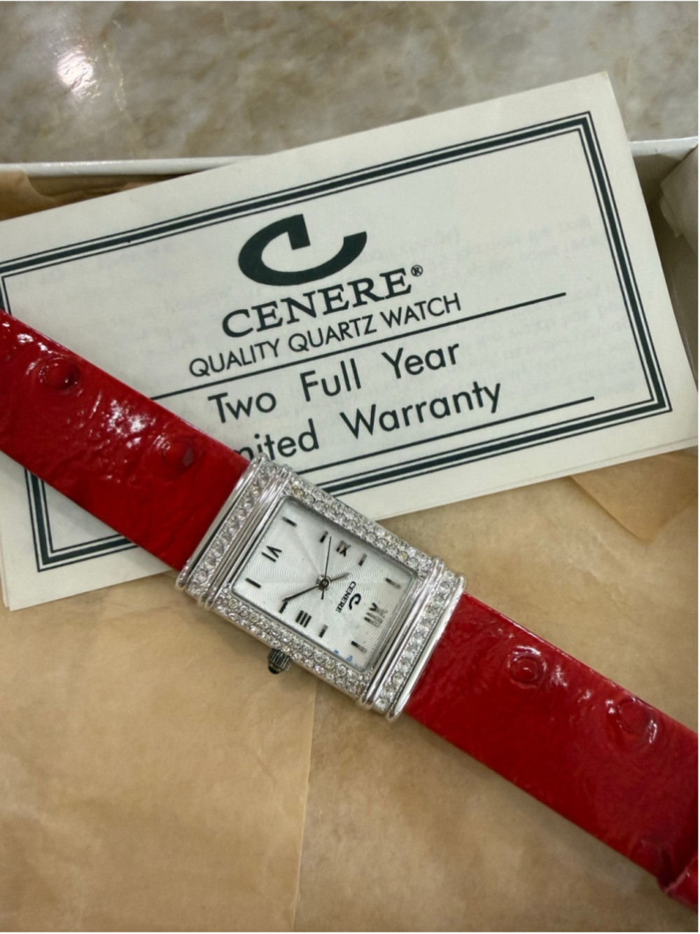Cenere New old stock vintage Quartz Watch, Red and Silver, brass stem with blue